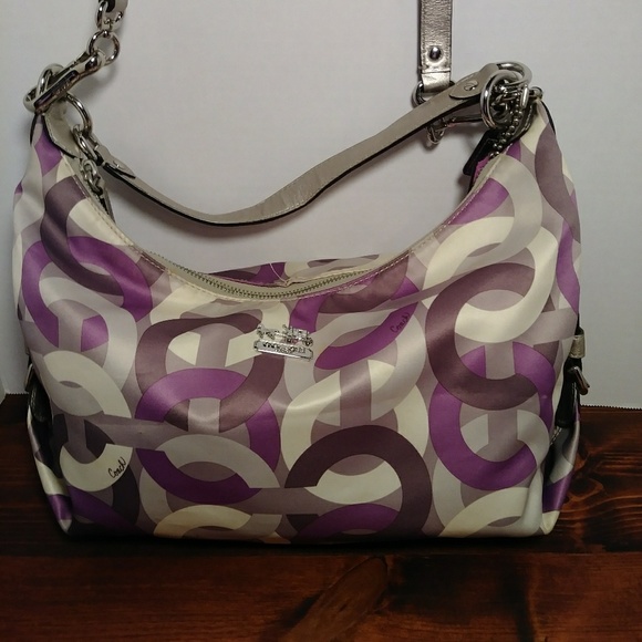 grey coach purse with purple inside